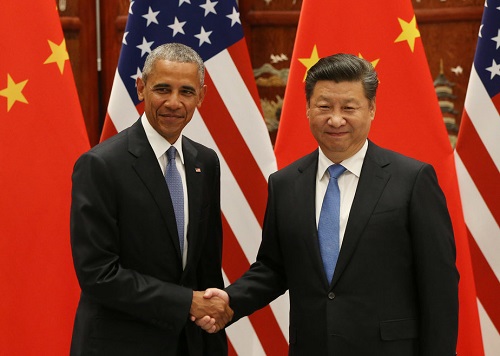 President Barack Obama and Chinese President Xi Jinping shake hands