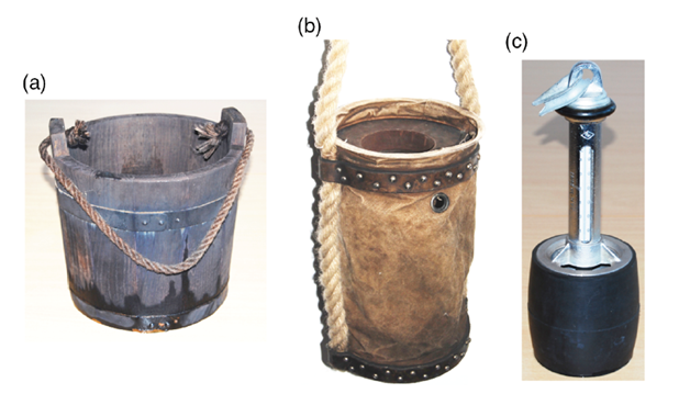 A wooden bucket, canvas bucket and modern German scoop