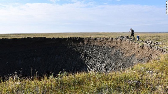 Inspection of tundra crater in Siberia Aug 2020